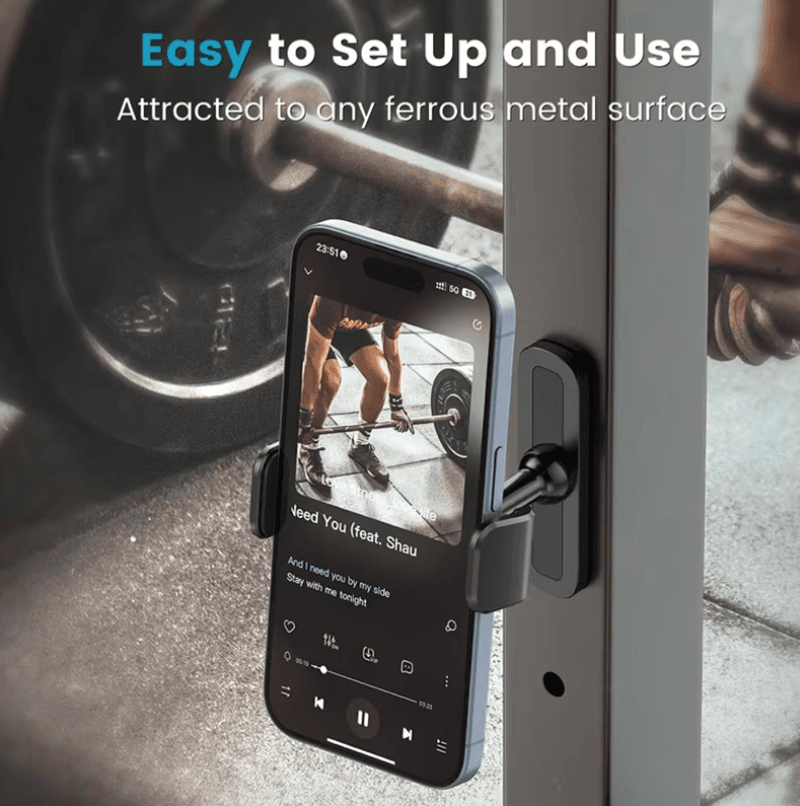 Magnetic phone holder attached to a metal gym rack, holding a smartphone near weights.